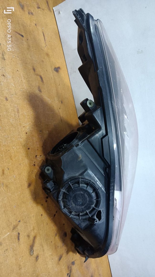 Farol Opel Insignia ótica xenon 2009