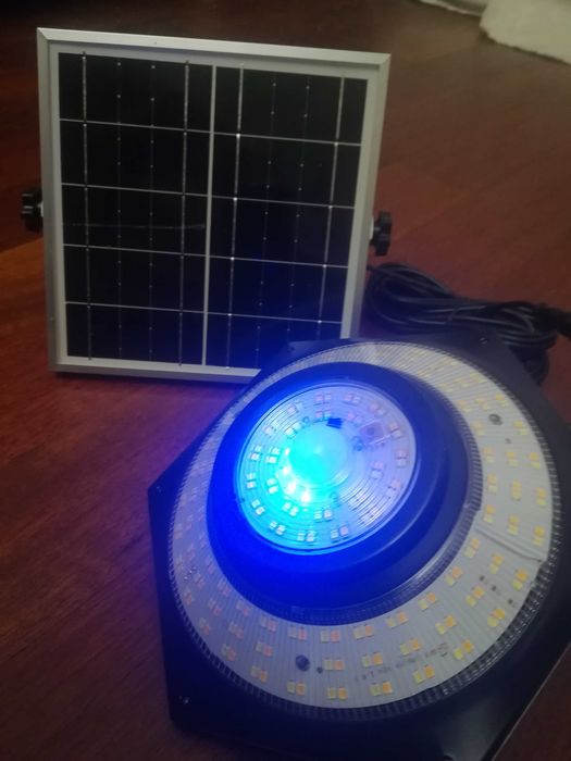 Solarna lampa z czujnikiem ruchu na zewnątrz i do środka , pilot.