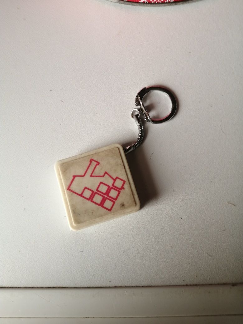 Fita métrica porta chaves