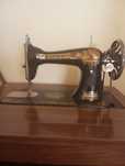 Máquina de costura Singer.