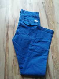 Niebieskie spodnie jeansy slim, rozmiar 28