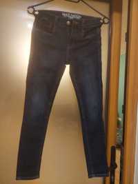 Granatowe jeansy chłopięce elastyczne jak nowe 140