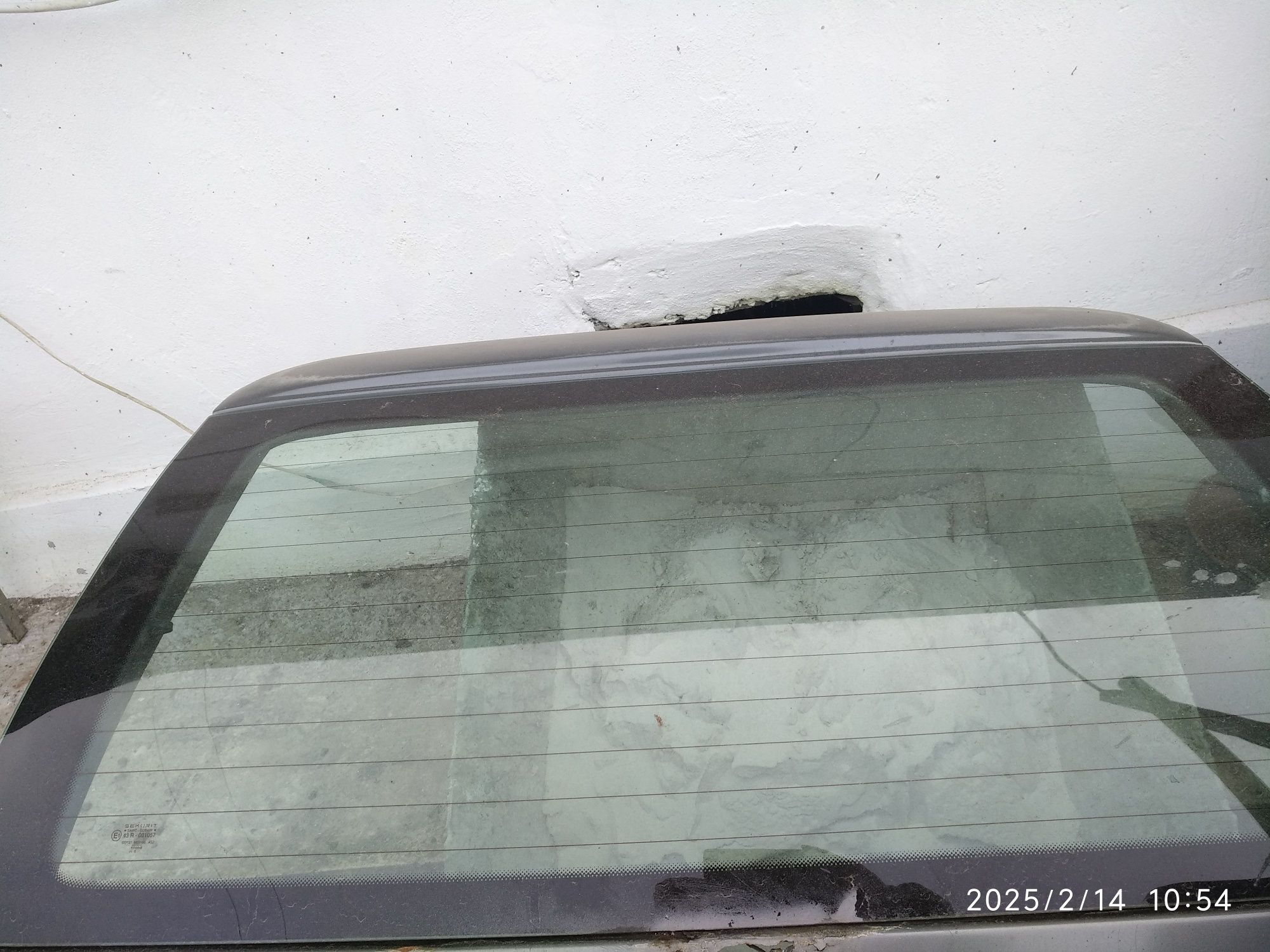 Заднє скло FORD ESCORT