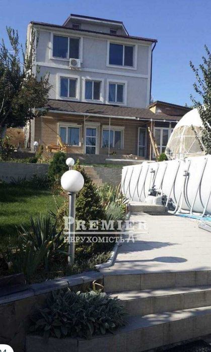 Продам сучасний двоповерховий будинок