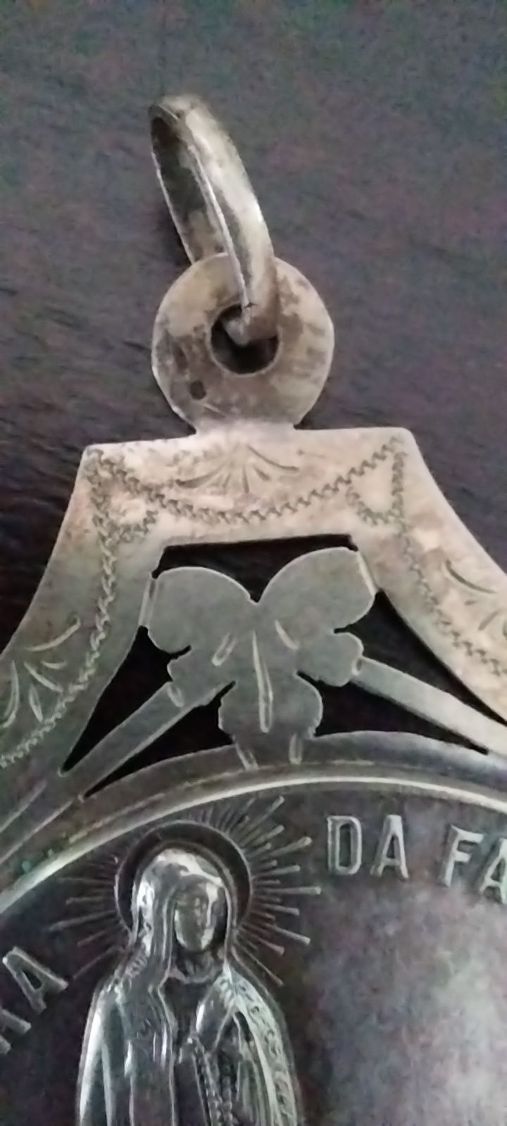 Medalha antiga em prata