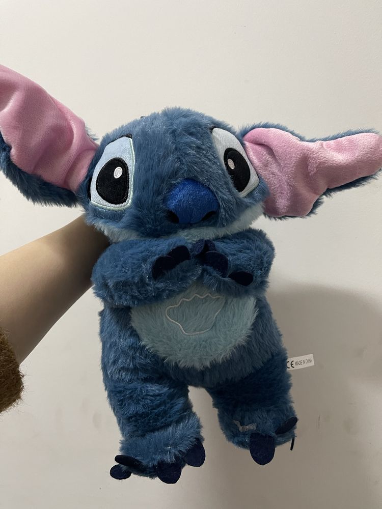 Stitch que respira e da musica (tamanho 30cm)