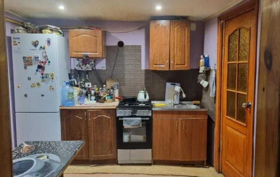 Продам 1/2 дома на Холодний горе.