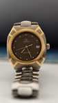 Omega
Polaris Titane 120m e Ouro 18K; Ano 1982