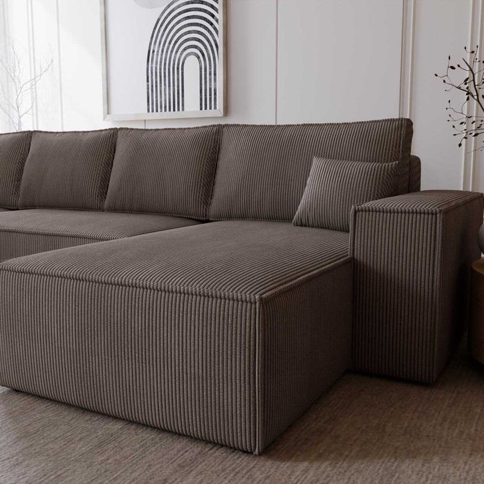 Duży narożnik z funkcją spania i pojemnikiem tkanina sztruks Bergamo U