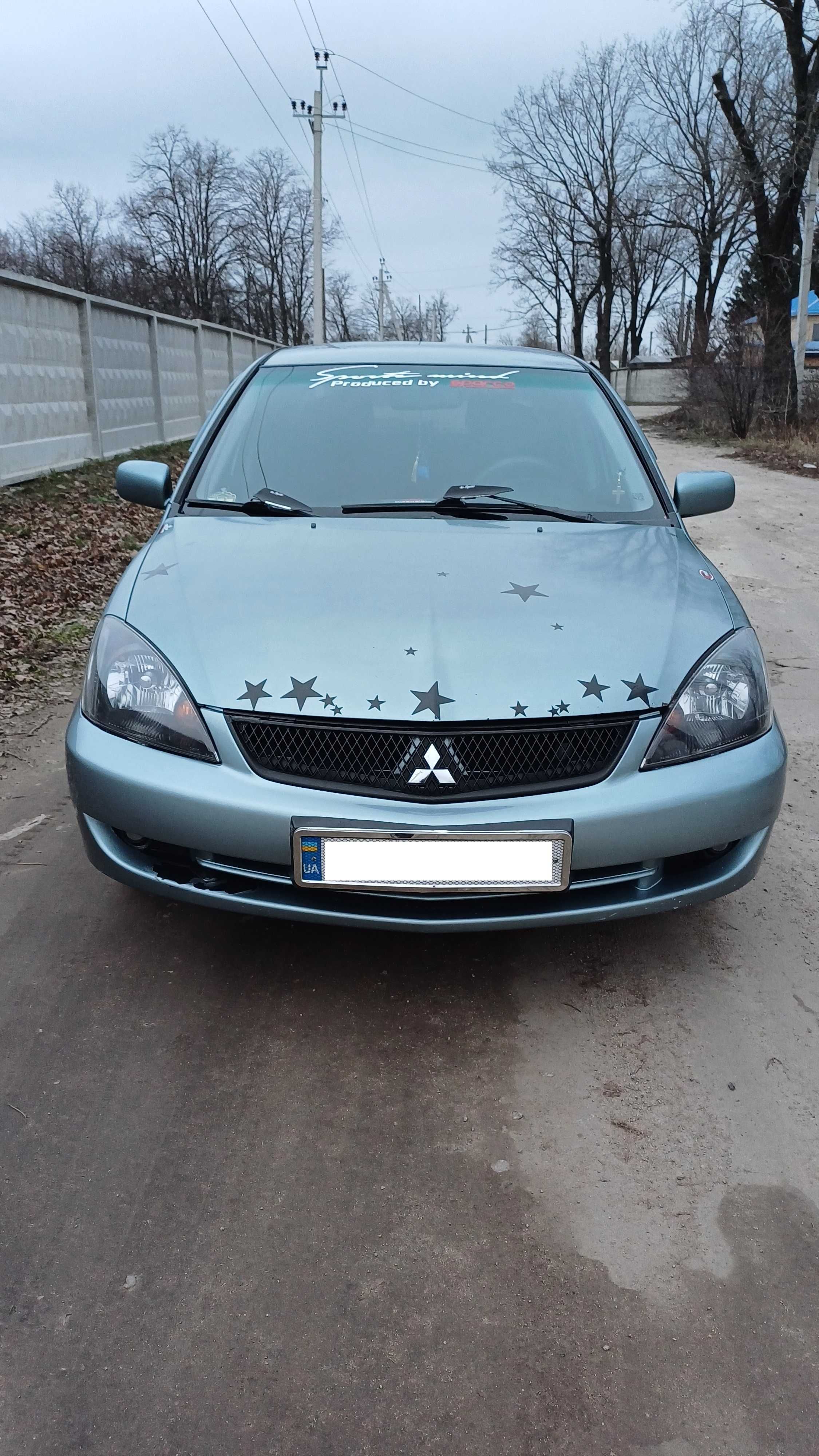 Mitsubishi Lancer 9 (2006 рік) (Газ-Бензин)