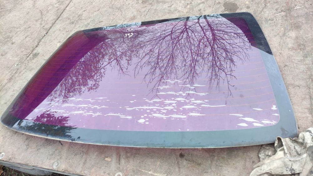 Стекло заднее на Джили МК