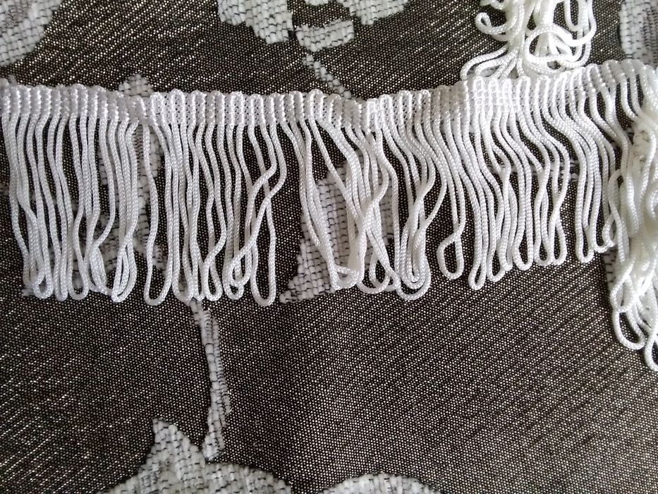 Бахрома,наклейки "глазки", вишитая лента.