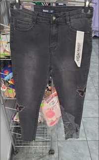 Nowe jeans z motylem