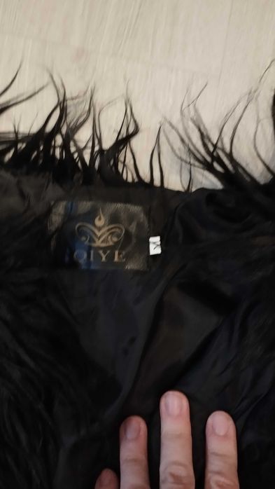 Casaco de pelo preto