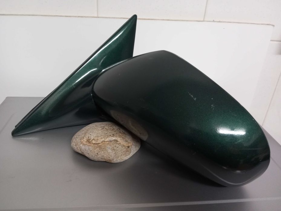 Suporte espelho esqº Suzuki Baleno