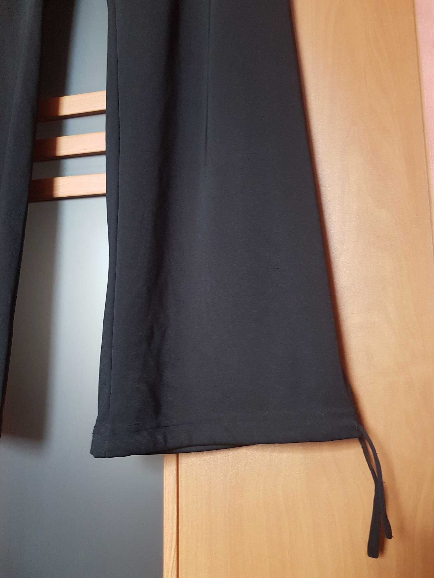 Spodnie czarne, szerokie nogawki, wiązanie w pasie, nogawkach, r. 42