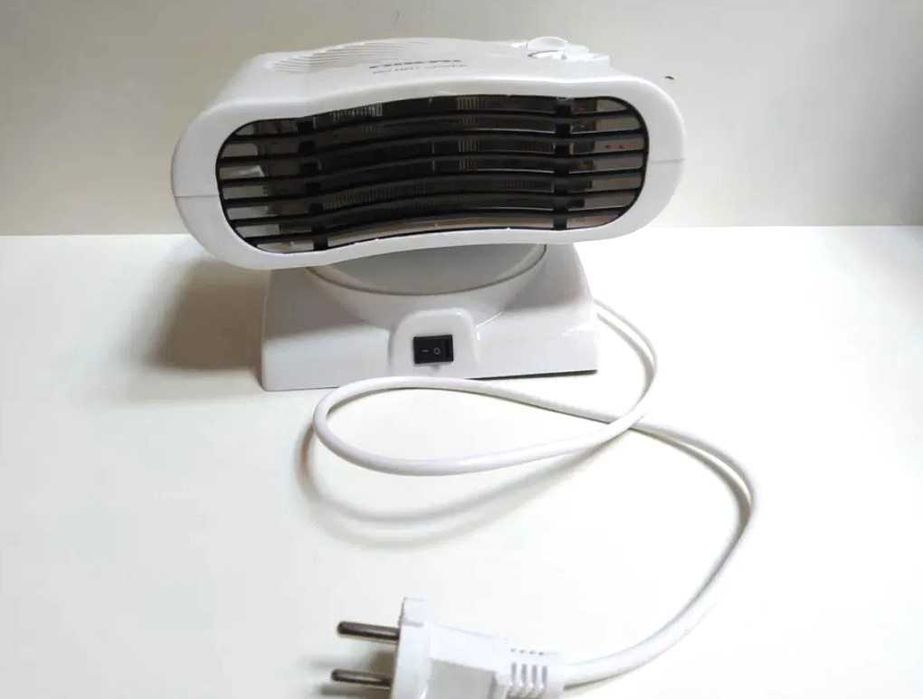 GRZEJNIK ELEKTRYCZNY farelka piecyk 2000W obrotowy dwa tryby mocy