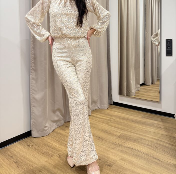 Вечірній костюм з паєтками штани кльош