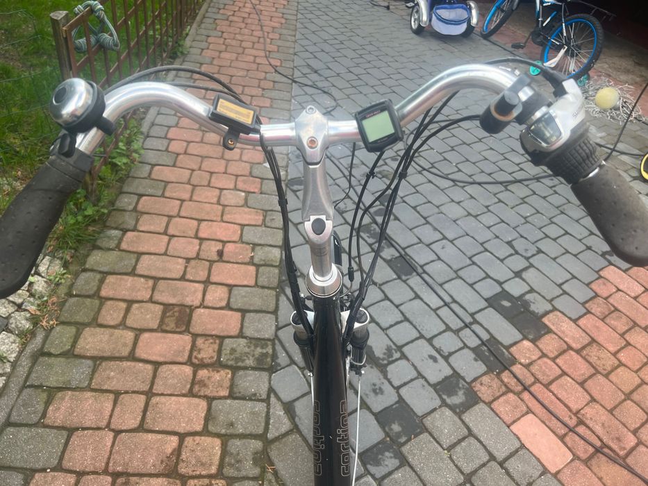 Rower elektryczny Cortina  rama 53 cm.  kola 28