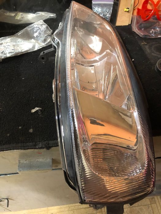 Фара левая Опель Астра G