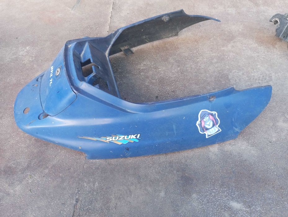 боковий пластик, лючок бензобака Suzuki Sepia zz