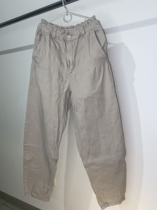 Бежеві джинсові штани