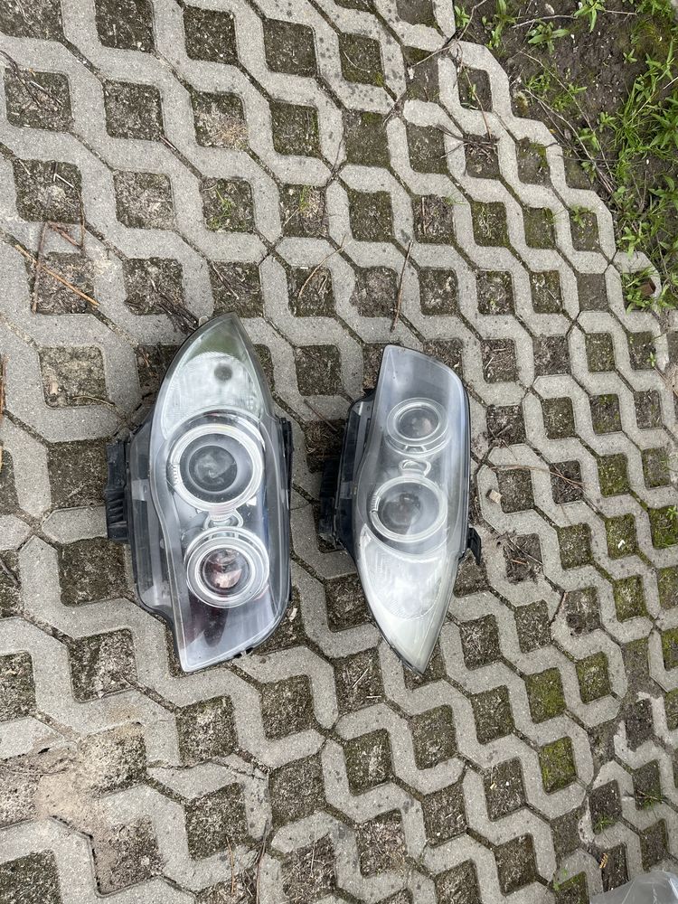 BMW 1 E82 E88 E87 LIFT 07-11 Lewy Reflektor