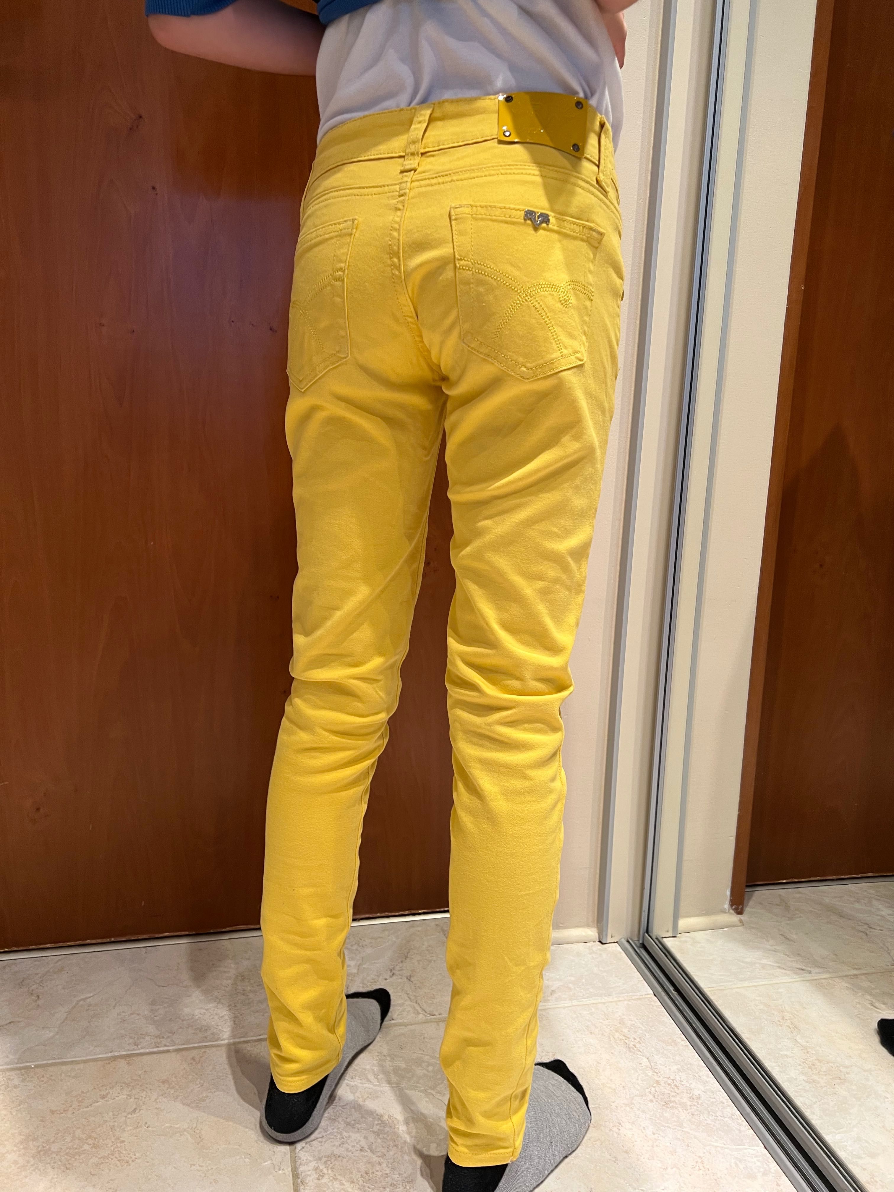 Jeansy żółte. Rozmiar 34, XS firmy Revers
