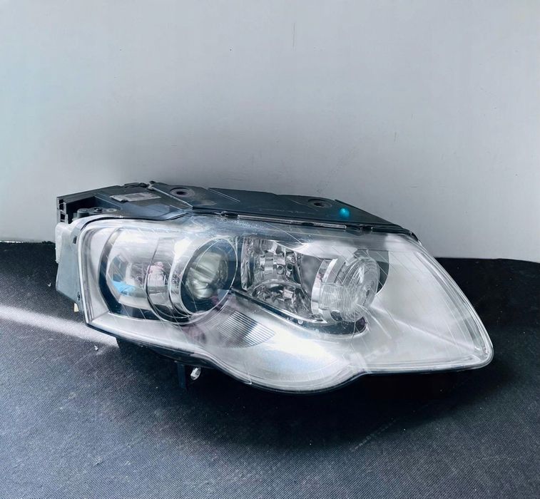 LAMPA PRAWA REFLERTOR PRAWY VW PASSAT B6 BI XENON SKRĘTNY PRZED LIFT EU