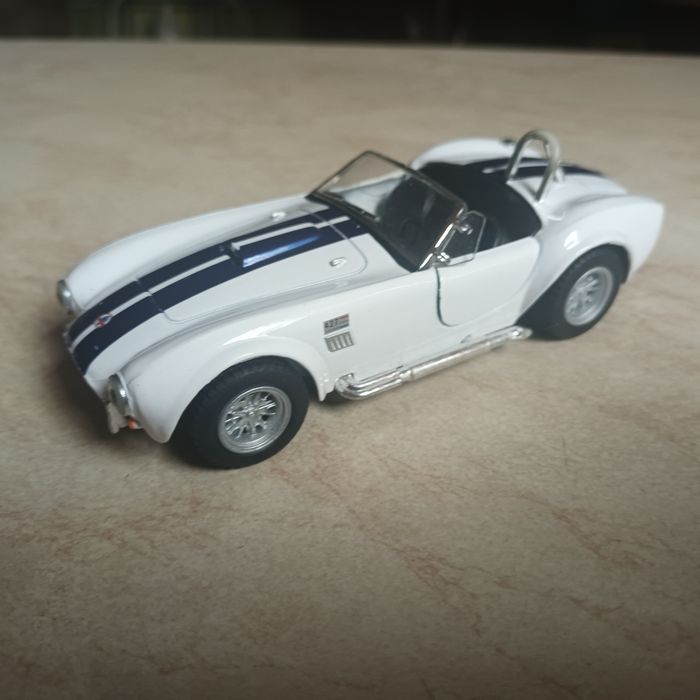 Машинки Kinsmart