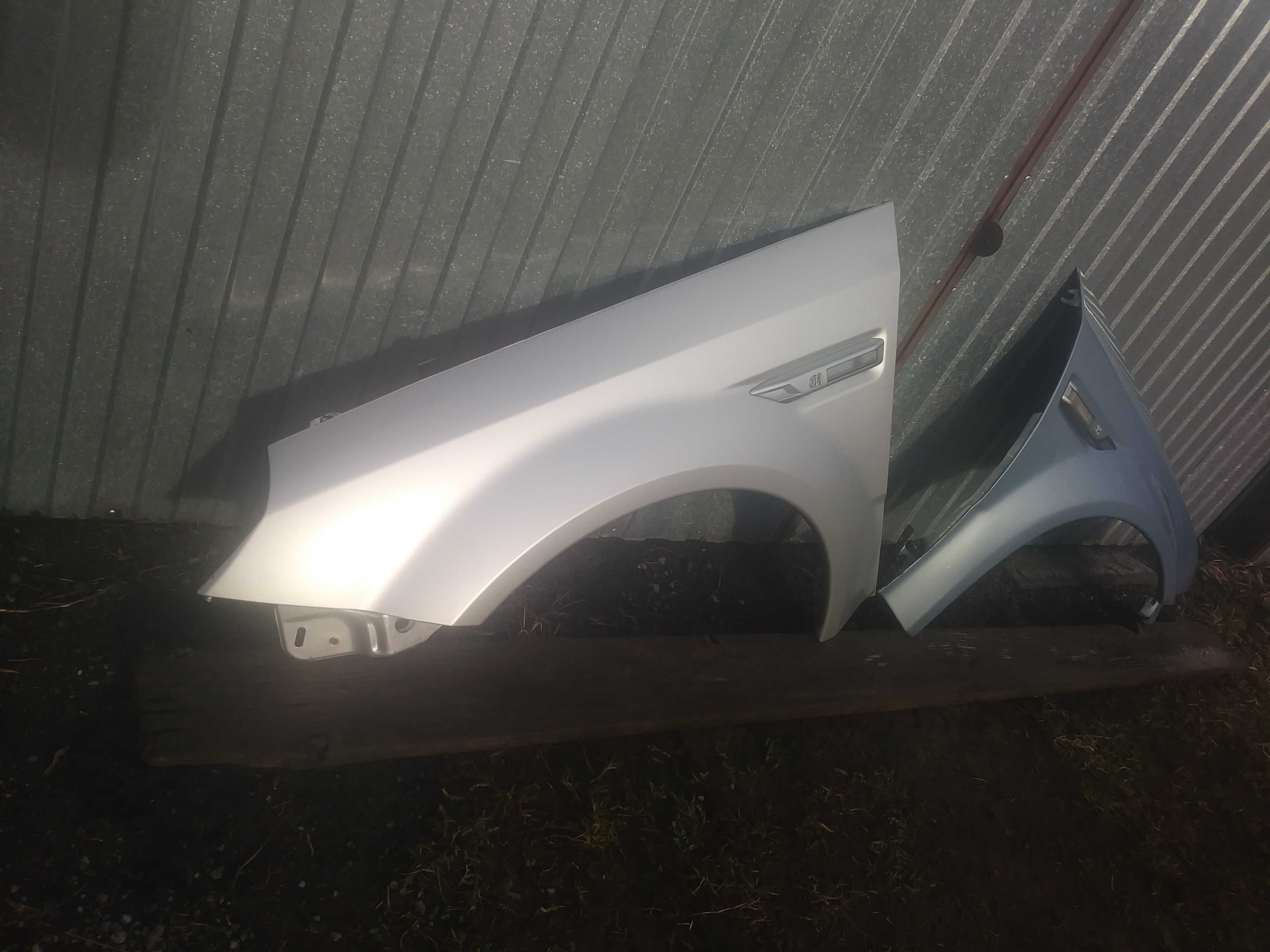 Opel Tigra 2 II Błotnik lewy przód srebrny Z157 prawy Z21C