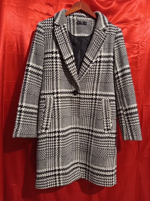 Жіноче осіннє пальто