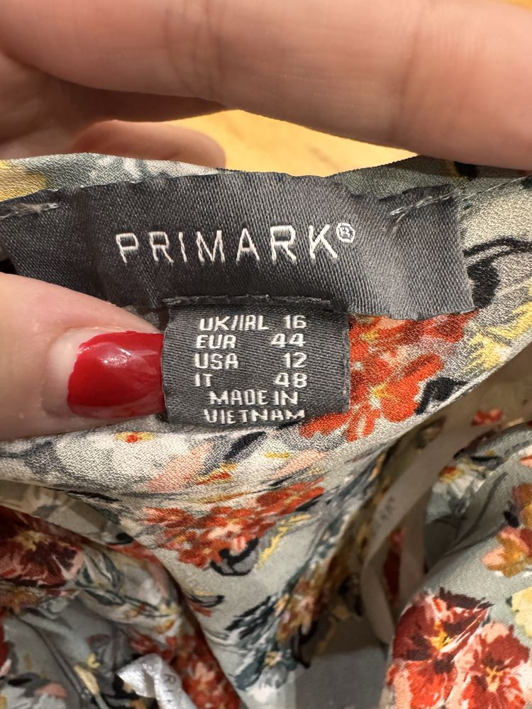 Bluzka w kwiatki z długim rękawem