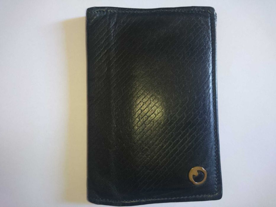 Гаманці тканинні і шкіряний