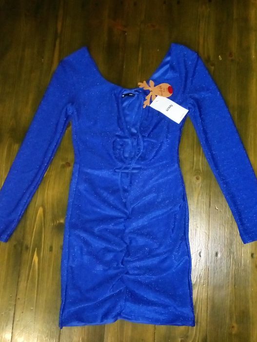 Блискуча мінісукня