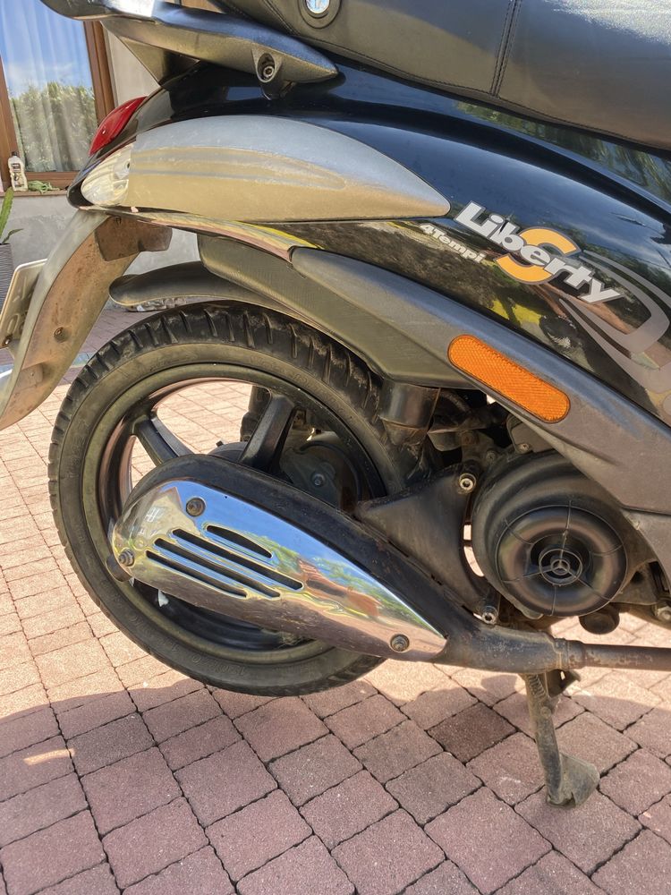 Скутер piaggio 4т