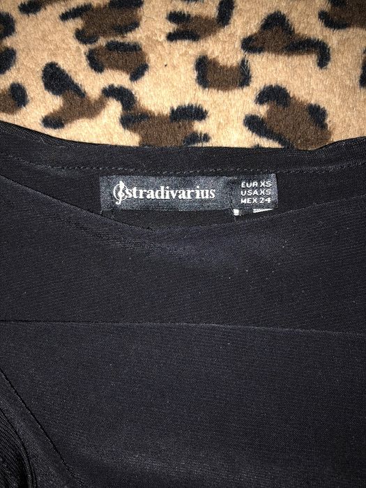 Bodysuit preto com folho da Stradivarius tamanho XS em bom estado.