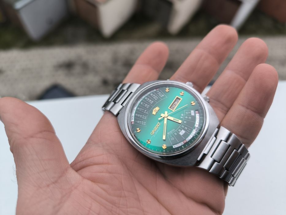 STAN NOWY zegarek orient zieleń cesarski patelnia królewski multi year