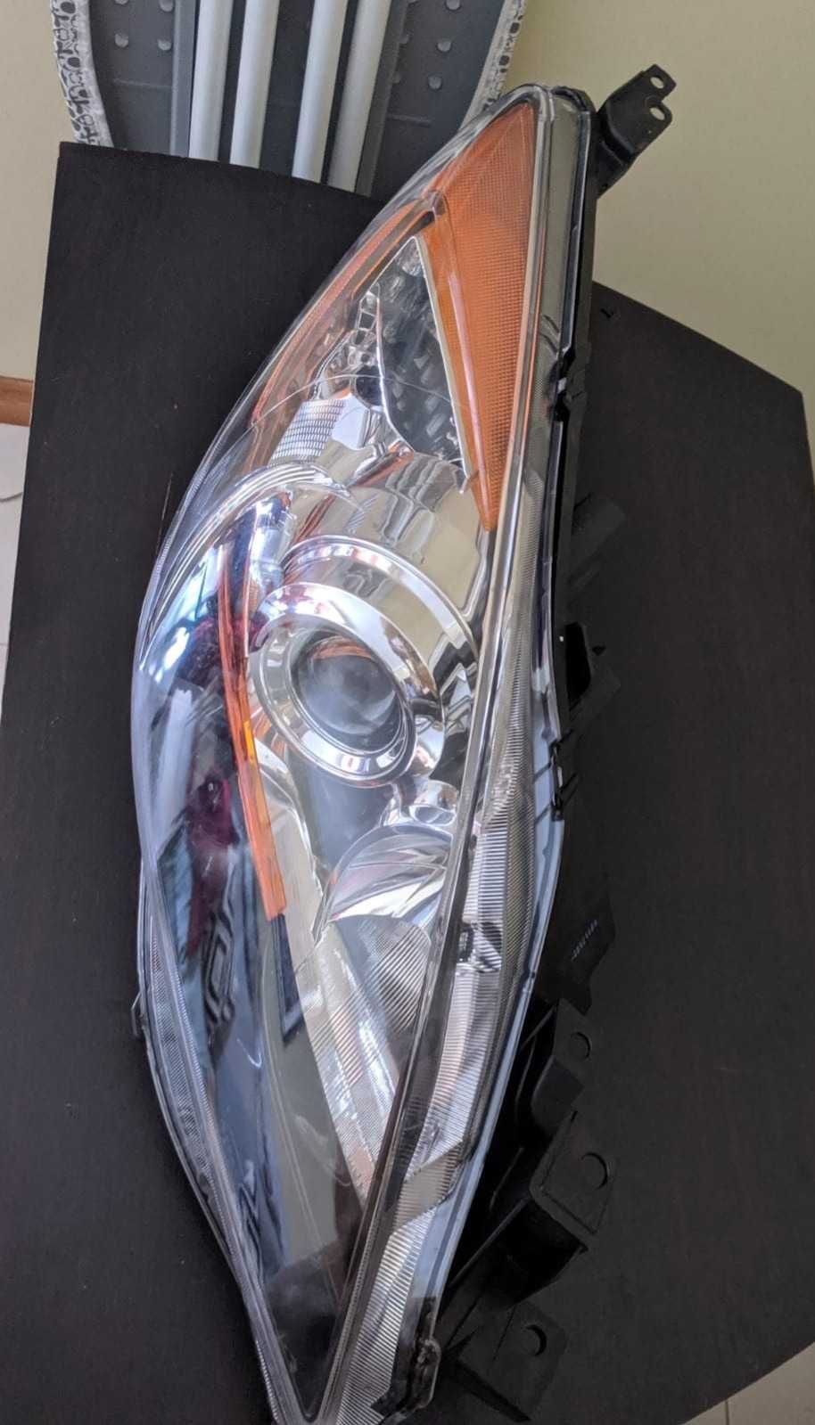 Farol/Ótica Mazda 3 (BL) (Lado DIREITO) - LER c/ ATENÇÃO!