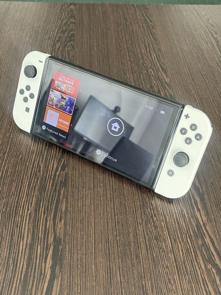 Nintendo Switch OLED + pad 8bitdo + Zelda BOTW
