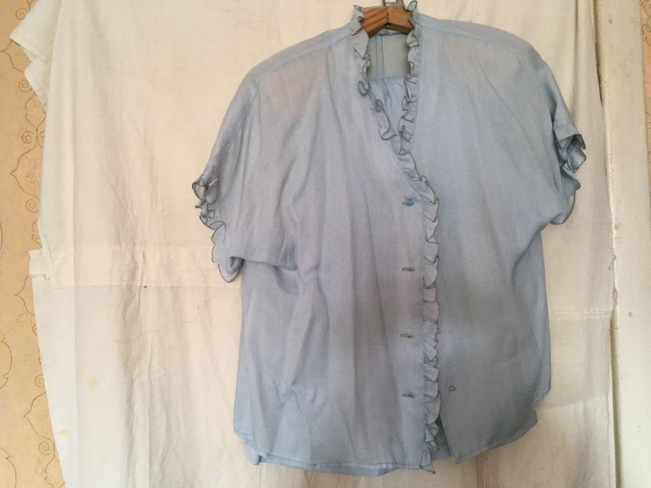 Комтюм жіночий колір світло голубий розмір 50-52 літній вживаний