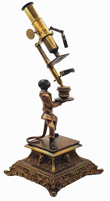 Brass reproduction of a “monkey microscope”