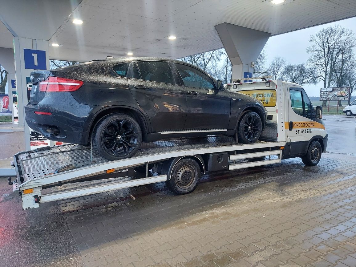 Pomoc drogowa auto laweta usługi transportowe auto holowanie transport