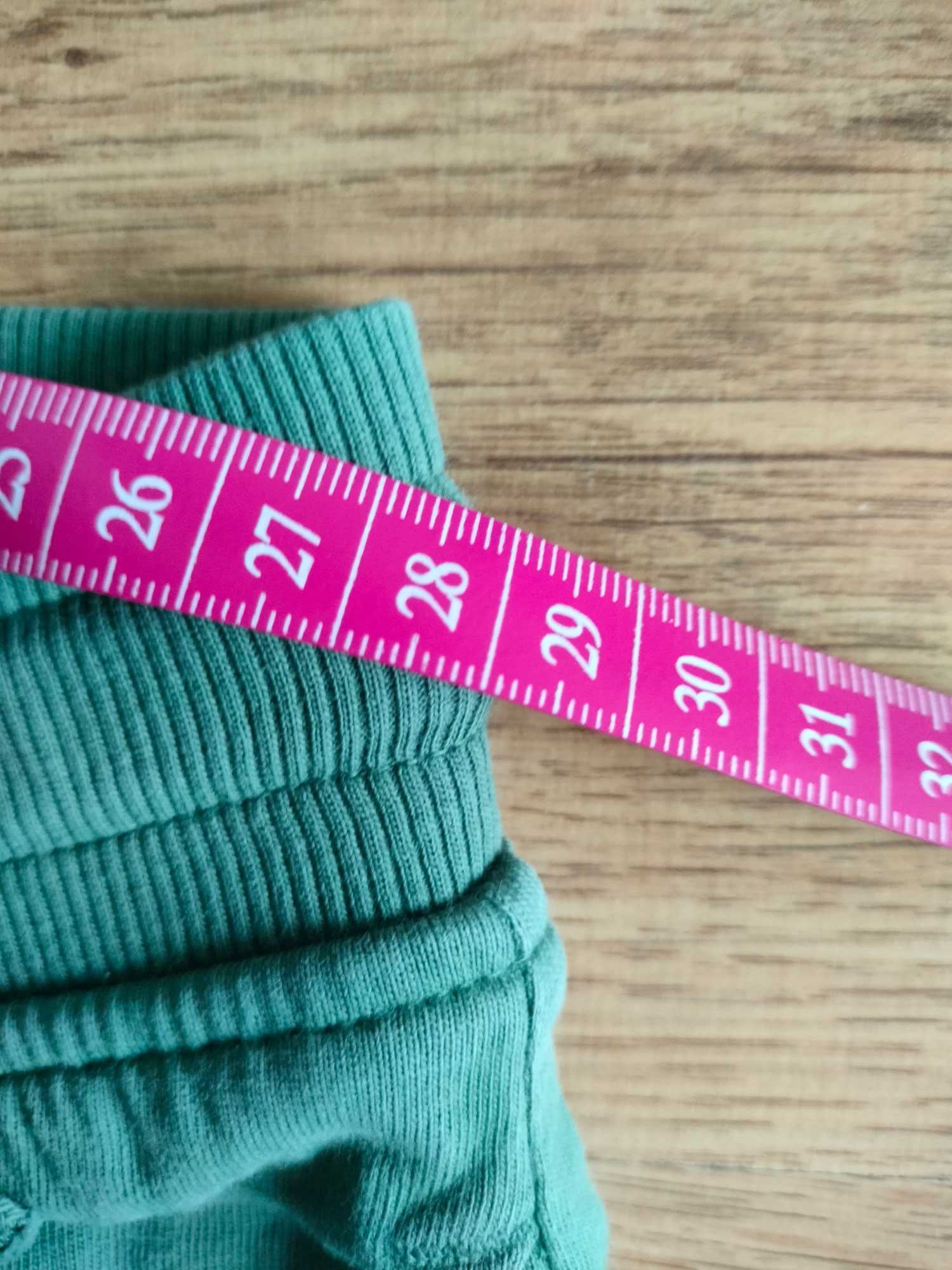 Zielone spodnie dresowe chłopięce H&M 134 cm