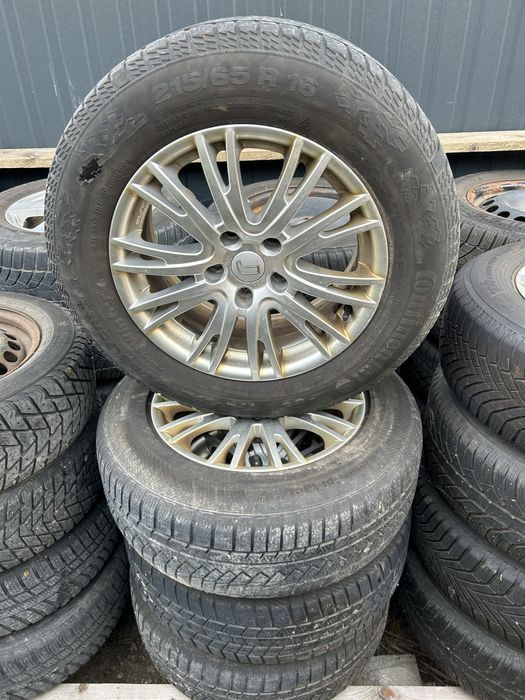 Felgi aluminiowe 16 cali 5x114,3 opony zimowe 215/65 16 Nissan