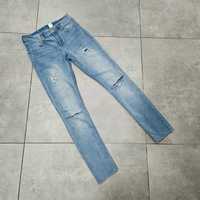 H&M jeansowe rurki z rozdarciami   11-12Y