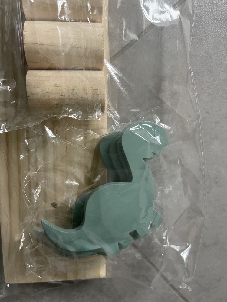 Wieszak z dinozaurami nowy