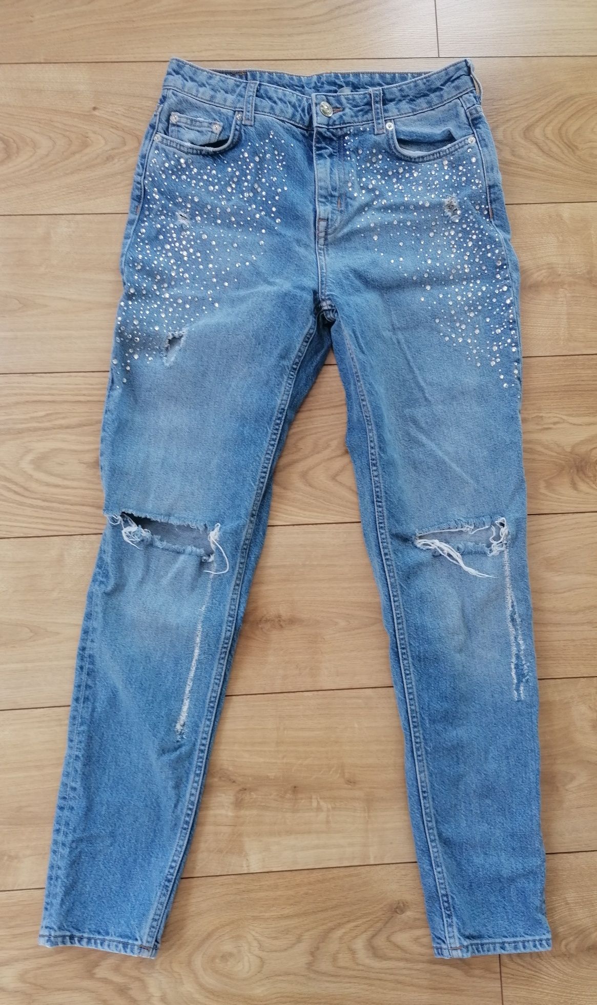 Spodnie damskie jeansowe z dziurami H&M rozmiar 38