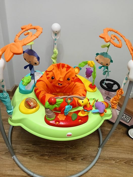 FISHER PRICE skoczek z dźwiękami Wesoła dżungla Jumperoo