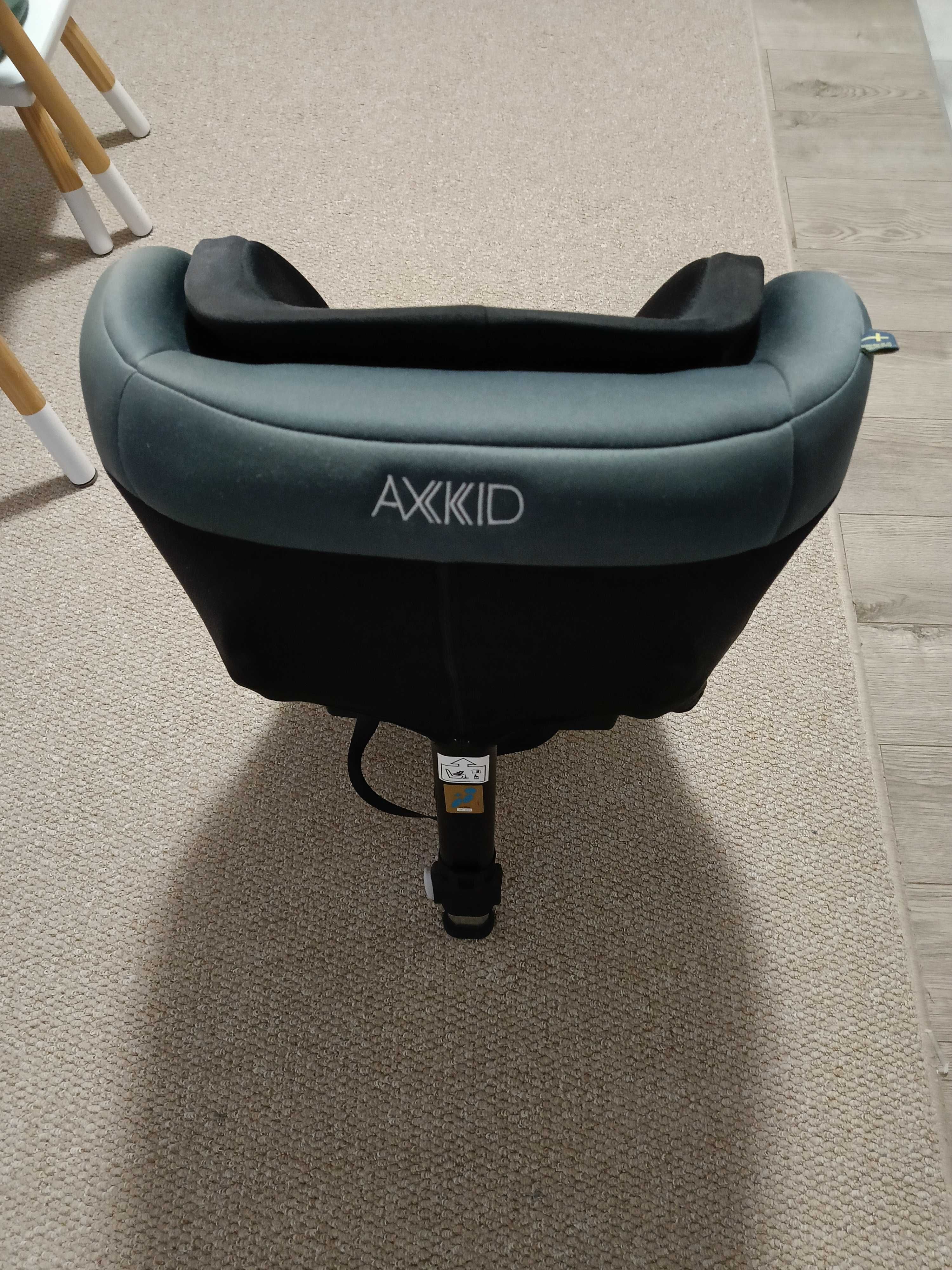 Sprzedam Fotelik AXKID MOVE 9-25kg Tyłem do kierunku jazdy!!!Stan Bdb